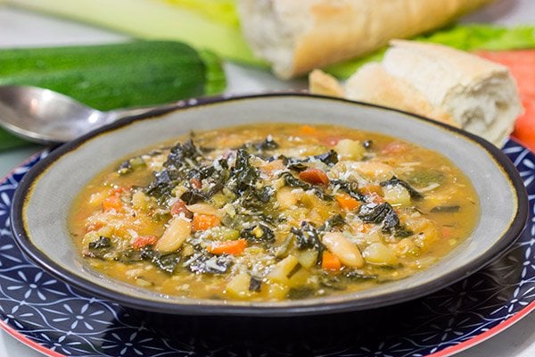 With chilly Winter days around the corner, grab some leftover bread and make a pot of Ribollita.  This Tuscan White Bean Stew is a delicious way to warm up on a cold day!