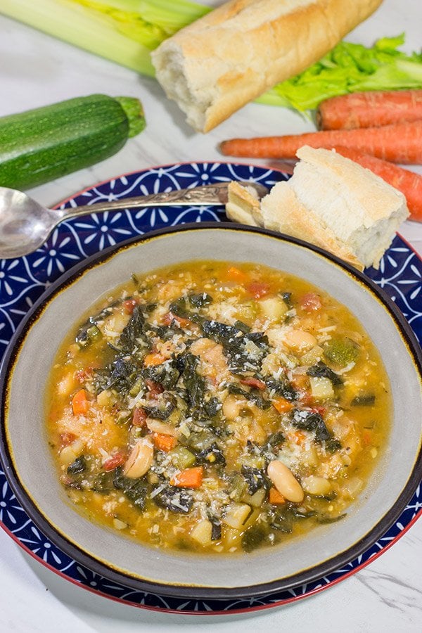 With chilly Winter days around the corner, grab some leftover bread and make a pot of Ribollita.  This Tuscan White Bean Stew is a delicious way to warm up on a cold day!