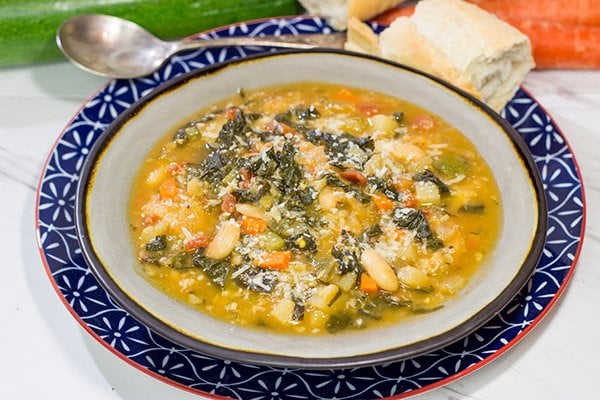 With chilly Winter days around the corner, grab some leftover bread and make a pot of Ribollita.  This Tuscan White Bean Stew is a delicious way to warm up on a cold day!