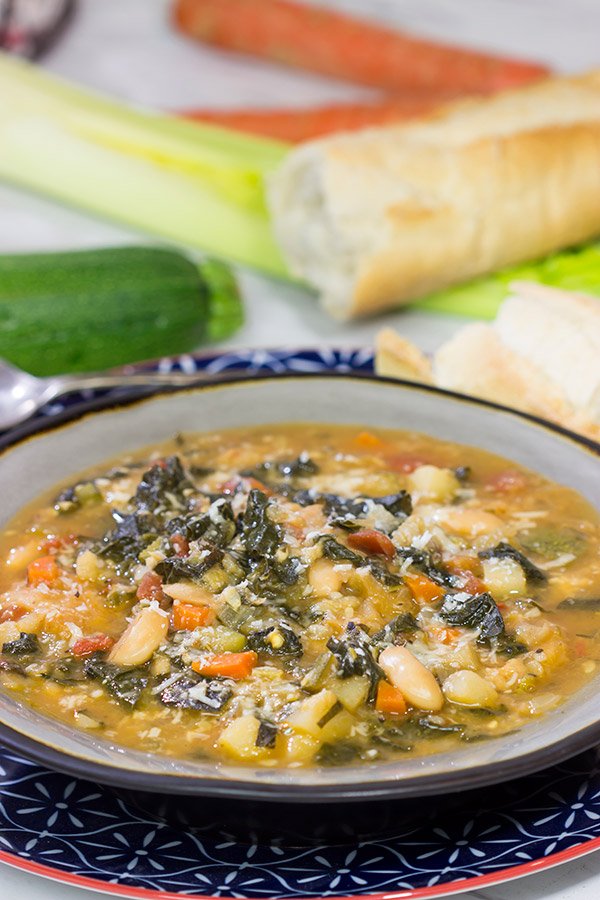 With chilly Winter days around the corner, grab some leftover bread and make a pot of Ribollita.  This Tuscan White Bean Stew is a delicious way to warm up on a cold day!