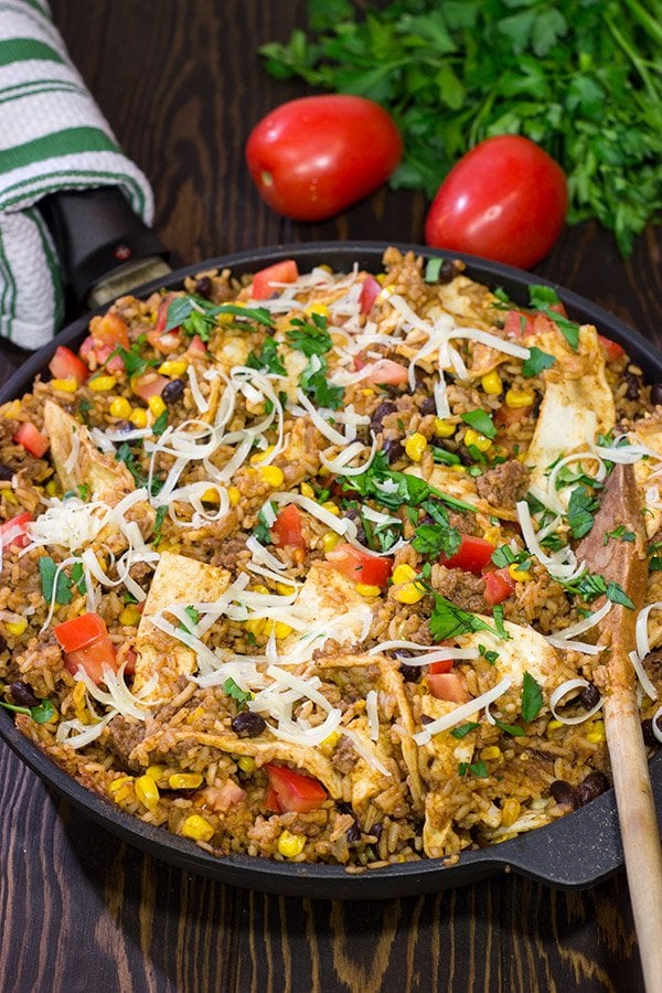 Looking for a fun way to mix up week night dinners?  Mix the burritos right into the filling with these tasty Skillet Beef Burritos!