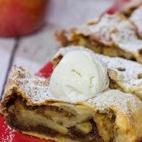 This classic Apple Strudel features crispy pastry dough filled with cinnamon, apples and rum-soaked raisins. It's a delicious way to celebrate apple season!
