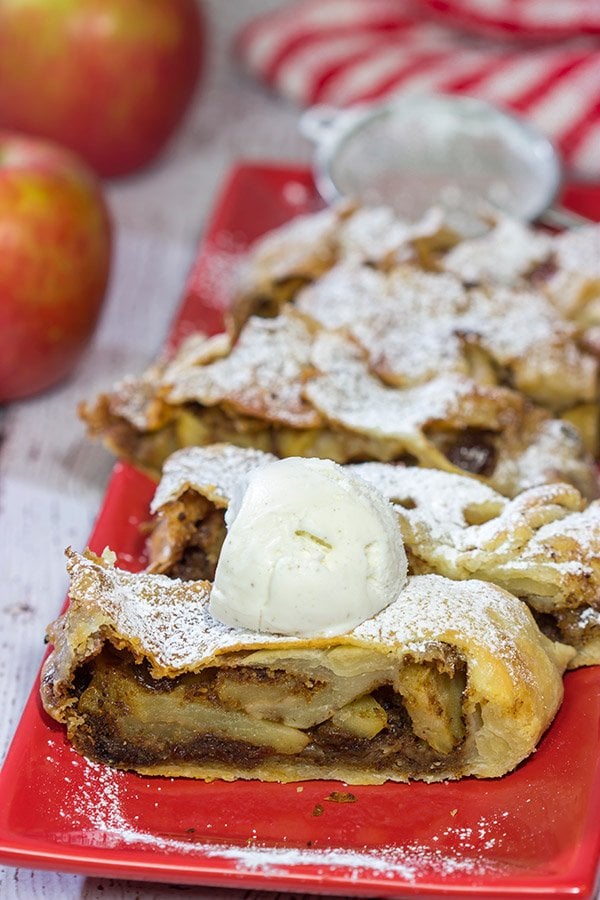 This classic Apple Strudel features crispy pastry dough filled with cinnamon, apples and rum-soaked raisins. It's a delicious way to celebrate apple season!