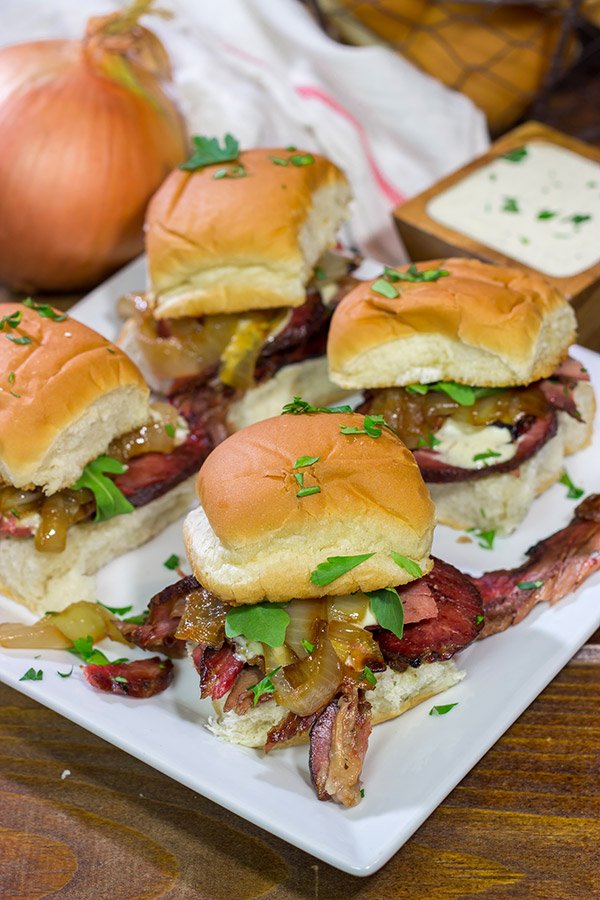 These Beef Brisket Sliders with Alabama White BBQ Sauce are proof that good things can come in small packages!  Make a batch of these sliders for dinner tonight!