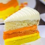 Whether you love or hate actual candy corn, this Candy Corn Cake is a delicious way to celebrate Halloween!  Happy baking!