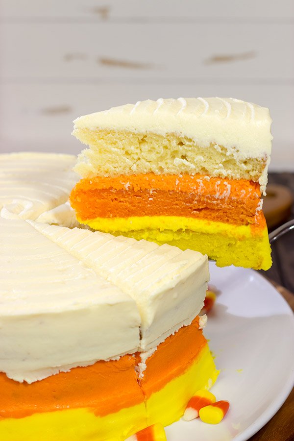 Whether you love or hate actual candy corn, this Candy Corn Cake is a delicious way to celebrate Halloween!  Happy baking!