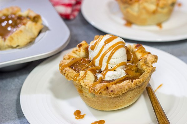Packed with flavorful apples and topped with delicious caramel, these Caramel Apple Tartlets are a great baking project for Autumn!