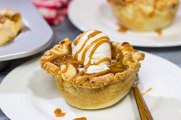 Packed with flavorful apples and topped with delicious caramel, these Caramel Apple Tartlets are a great baking project for Autumn!