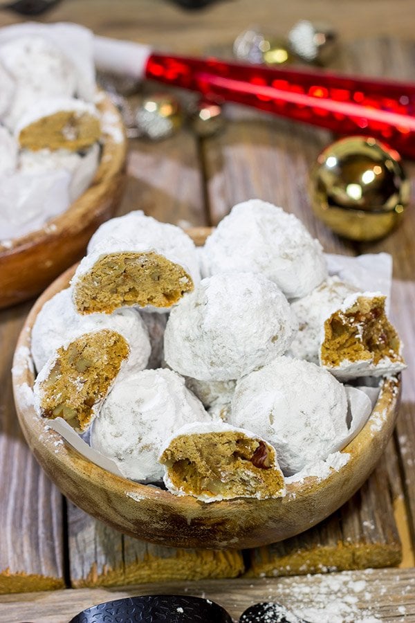 These Gingerbread Snowball Cookies are what happens when you throw snowballs at gingerbread cookies.  They're a delicious combination of two favorite holiday cookies!