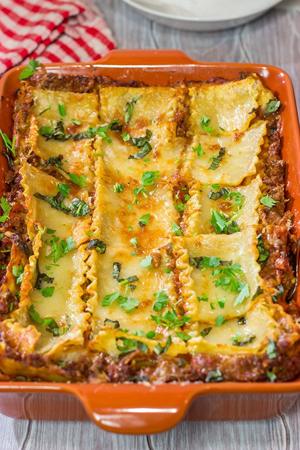 This Lasagna Bolognese features layers upon layers of delicious flavor...it's one heck of a delicious comfort food recipe!
