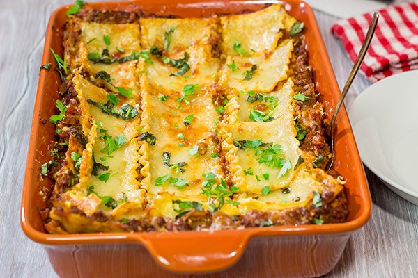 This Lasagna Bolognese features layers upon layers of delicious flavor...it's one heck of a delicious comfort food recipe!