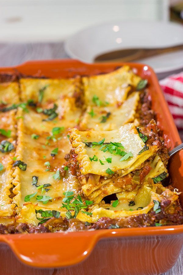 This Lasagna Bolognese features layers upon layers of delicious flavor...it's one heck of a delicious comfort food recipe!