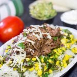 Craving some delicious comfort food?  Then put these Slow Cooker Beef Barbacoa Burrito Bowls on the menu!