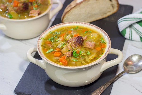 This Slow Cooker Split Pea Soup is an easy and delicious recipe.  It's packed with flavor, and it's perfect for warming up on a chilly day!