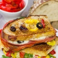 Packed with a variety of Italian meats and cheeses, this Antipasta Grilled Cheese is like a delicious appetizer platter...just in a cheesy, sandwich form!