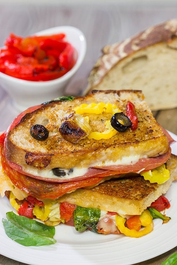 Packed with a variety of Italian meats and cheeses, this Antipasta Grilled Cheese is like a delicious appetizer platter...just in a cheesy, sandwich form!