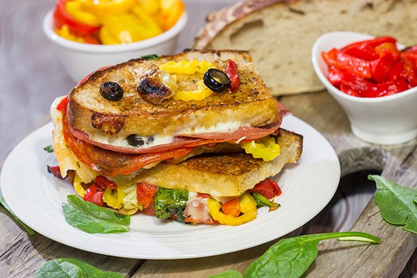 Packed with a variety of Italian meats and cheeses, this Antipasta Grilled Cheese is like a delicious appetizer platter...just in a cheesy, sandwich form!