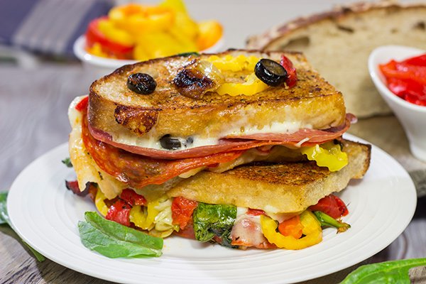 Packed with a variety of Italian meats and cheeses, this Antipasta Grilled Cheese is like a delicious appetizer platter...just in a cheesy, sandwich form!