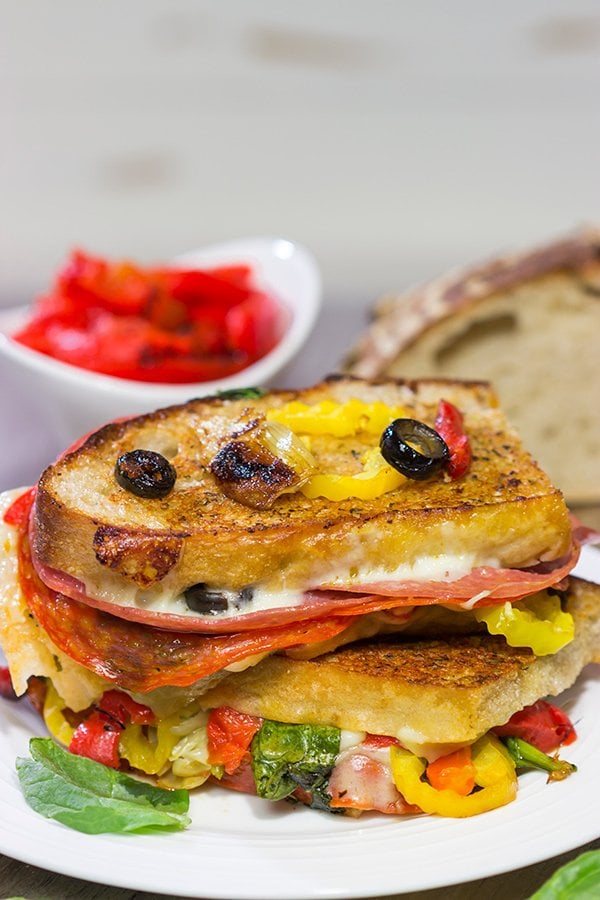 Packed with a variety of Italian meats and cheeses, this Antipasta Grilled Cheese is like a delicious appetizer platter...just in a cheesy, sandwich form!