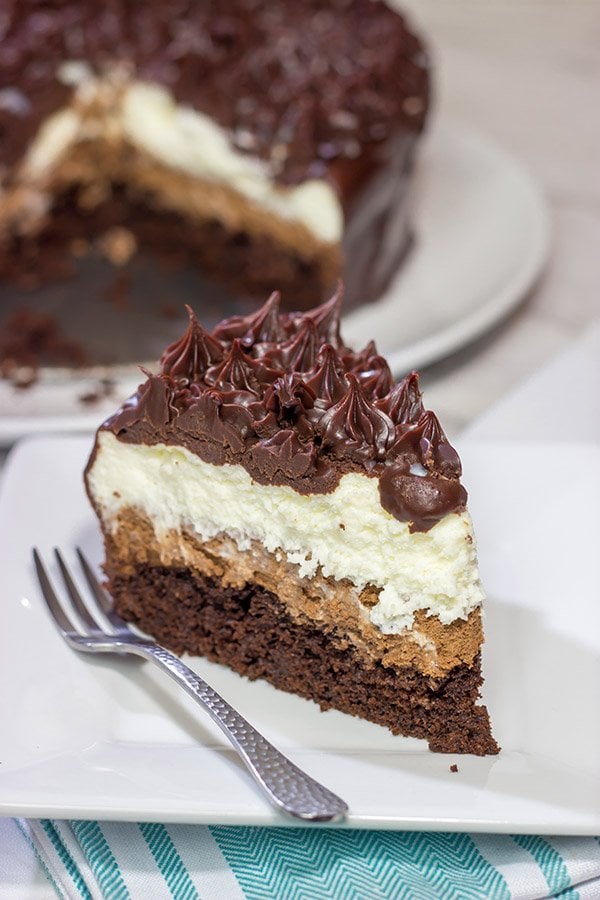 This Black Tie Mousse Cake features 4 distinct layers of chocolate. It takes a bit of time to make, but this sweet treat is worth the effort!