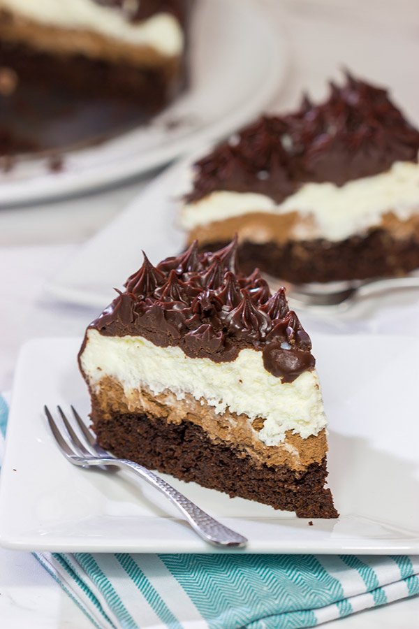 This Black Tie Mousse Cake features 4 distinct layers of chocolate.  It takes a bit of time to make, but this sweet treat is worth the effort!