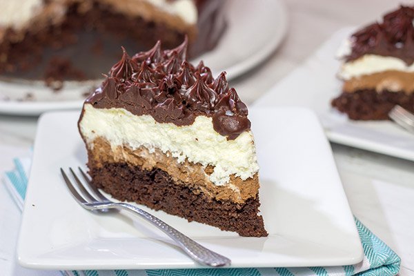 This Black Tie Mousse Cake features 4 distinct layers of chocolate.  It takes a bit of time to make, but this sweet treat is worth the effort!