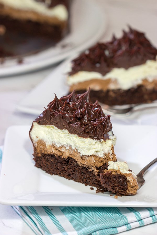 This Black Tie Mousse Cake features 4 distinct layers of chocolate.  It takes a bit of time to make, but this sweet treat is worth the effort!