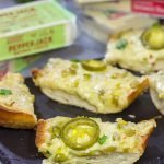 Topped with 2 types of cheese, this Cheesy Jalapeno Garlic Bread makes for a delicious addition to any meal!