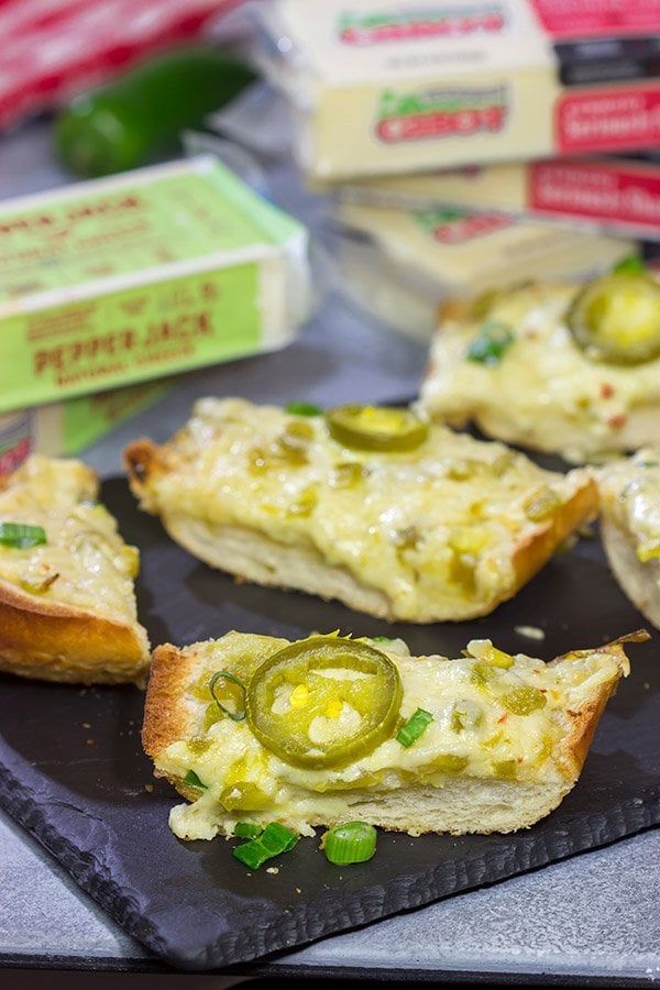Topped with 2 types of cheese, this Cheesy Jalapeno Garlic Bread makes for a delicious addition to any meal!