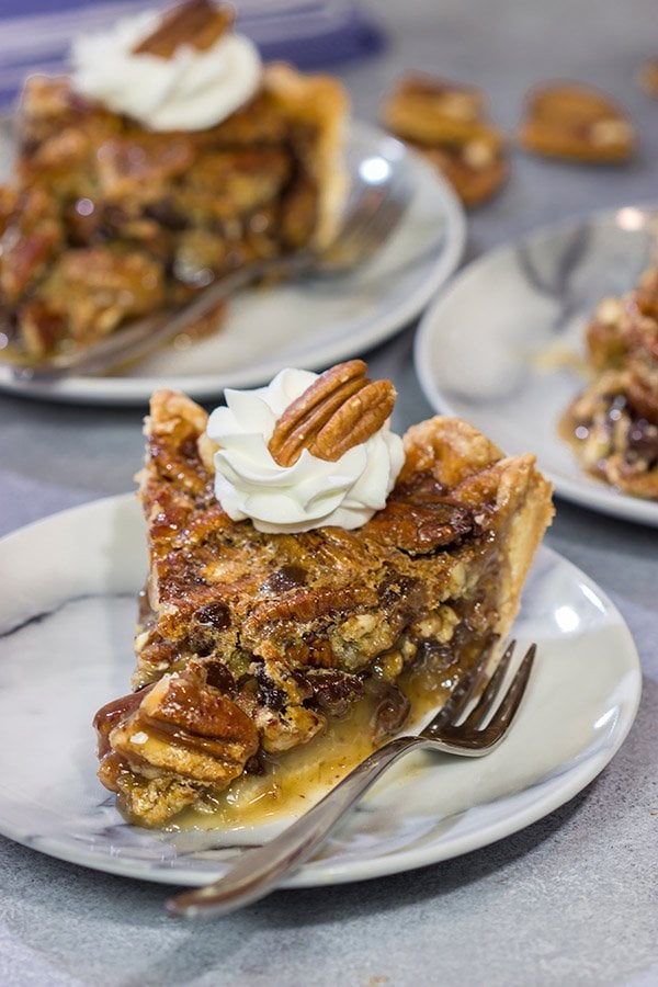 The traditional pecan pie gets a makeover in the form of this Chocolate Bourbon Pecan Pie.  It's a fun and delicious twist on a classic recipe.  Bake one up for dessert today!