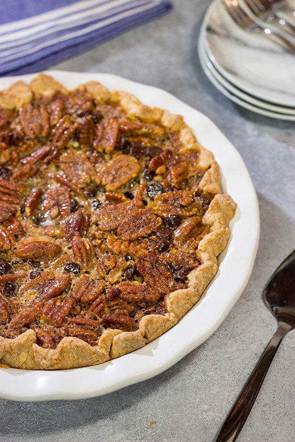 The traditional pecan pie gets a makeover in the form of this Chocolate Bourbon Pecan Pie.  It's a fun and delicious twist on a classic recipe.  Bake one up for dessert today!