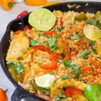 This Chicken Fajita Skillet is packed with flavor!  It starts on the stove top and then finishes baking in the oven - this easy one-pan meal is perfect for weeknight cooking!