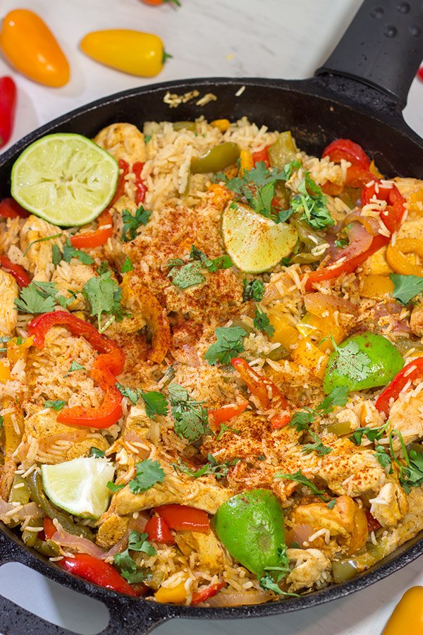 This Chicken Fajita Skillet is packed with flavor!  It starts on the stove top and then finishes baking in the oven - this easy one-pan meal is perfect for weeknight cooking!