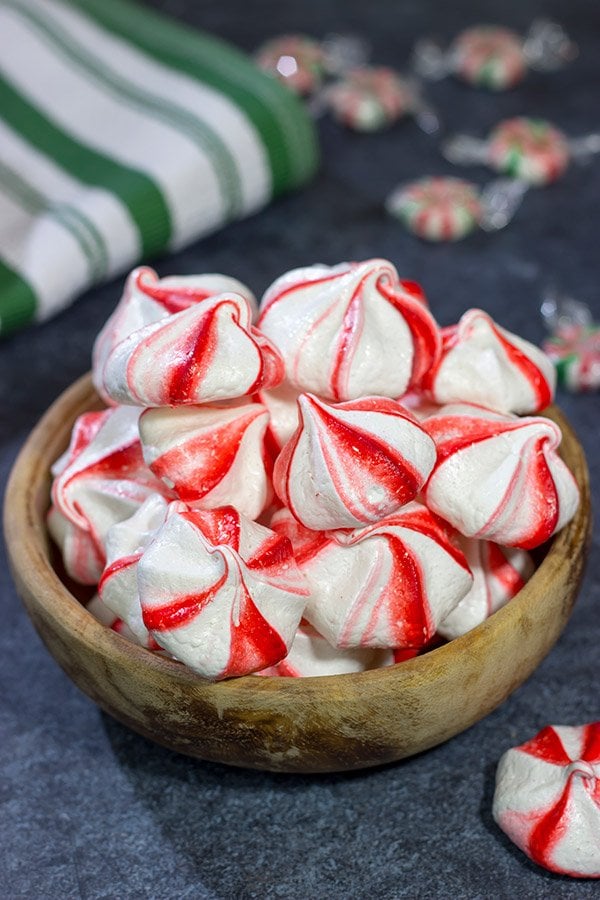 Add a festive touch to the holiday cookie tray with a batch of these Peppermint Meringues!  These light and airy treats are perfect for the holidays!