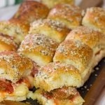 These Pull Apart Meatball Sliders are topped with garlic bread topping - they're a crowd-pleasing football appetizer!