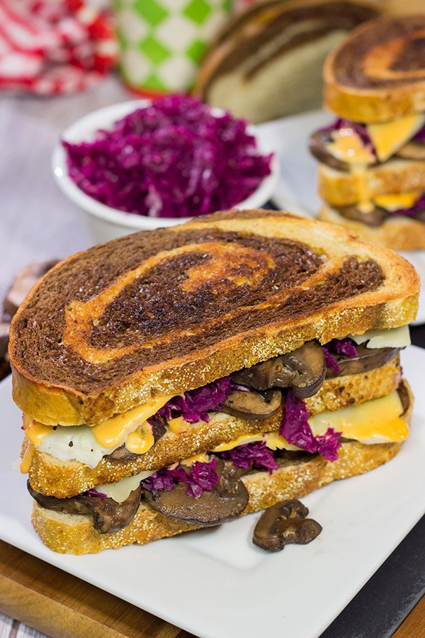 Get into the holiday spirit with this recipe for a Three Decker Toadstool and Sauerkraut Sandwich with Arsenic Sauce.  Merry Grinchmas!