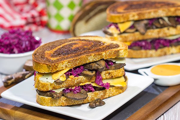 Get into the holiday spirit with this recipe for a Three Decker Toadstool and Sauerkraut Sandwich with Arsenic Sauce.  Merry Grinchmas!