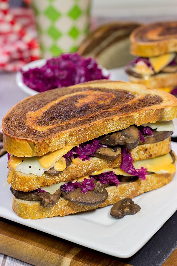 Get into the holiday spirit with this recipe for a Three Decker Toadstool and Sauerkraut Sandwich with Arsenic Sauce.  Merry Grinchmas!