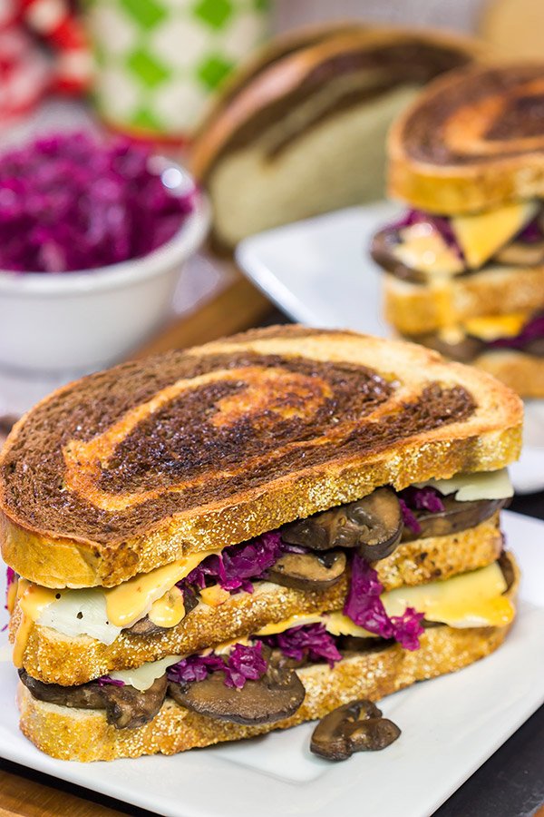 Get into the holiday spirit with this recipe for a Three Decker Toadstool and Sauerkraut Sandwich with Arsenic Sauce.  Merry Grinchmas!