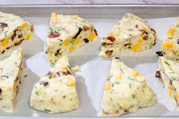 Packed with crispy bacon and melty cheese, these tasty Bacon Cheddar Scones are perfect for either morning brunch or as a side dish along with a bowl of soup!