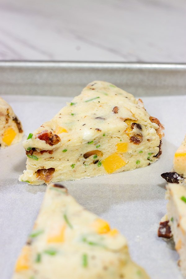 Packed with crispy bacon and melty cheese, these tasty Bacon Cheddar Scones are perfect for either morning brunch or as a side dish along with a bowl of soup!