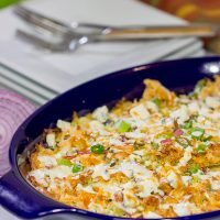Using frozen pierogies as the base, this Buffalo Chicken Pierogi Bake is a delicious comfort food casserole...and it can be made on a weeknight, too!