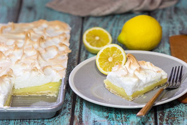Looking to feed a bunch of folks for a summer picnic?  Then put this Lemon Meringue Slab Pie on the menu!  It's a lot of pie...in the best way possible!