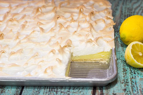 Looking to feed a bunch of folks for a summer picnic?  Then put this Lemon Meringue Slab Pie on the menu!  It's a lot of pie...in the best way possible!