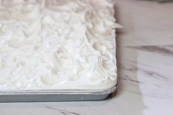 Looking to feed a bunch of folks for a summer picnic?  Then put this Lemon Meringue Slab Pie on the menu!  It's a lot of pie...in the best way possible!
