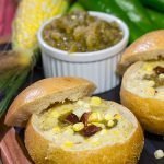 This Slow Cooker New England Corn Chowder includes a secret ingredient - roasted New Mexico green chile!  A bowl of this chowder is perfect for Autumn evenings.