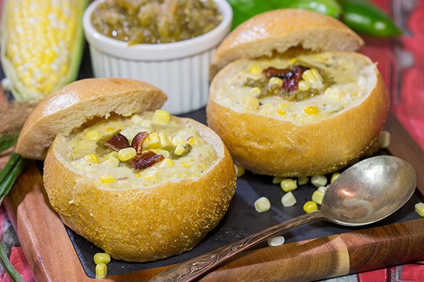 This Slow Cooker New England Corn Chowder includes a secret ingredient - roasted New Mexico green chile!  A bowl of this chowder is perfect for Autumn evenings.