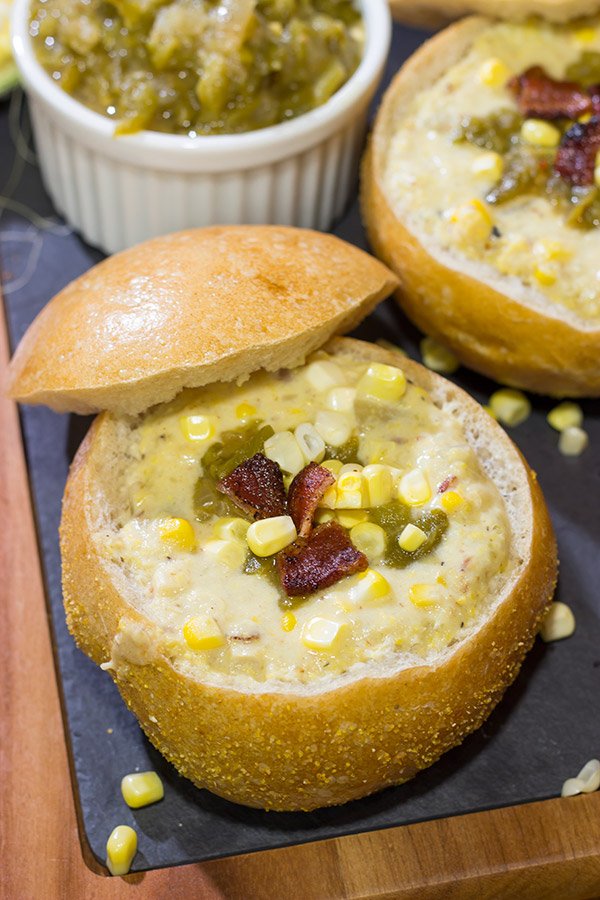 This Slow Cooker New England Corn Chowder includes a secret ingredient - roasted New Mexico green chile!  A bowl of this chowder is perfect for Autumn evenings.