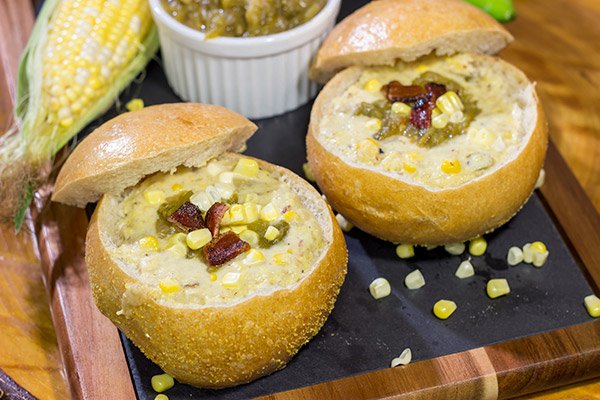 This Slow Cooker New England Corn Chowder includes a secret ingredient - roasted New Mexico green chile!  A bowl of this chowder is perfect for Autumn evenings.