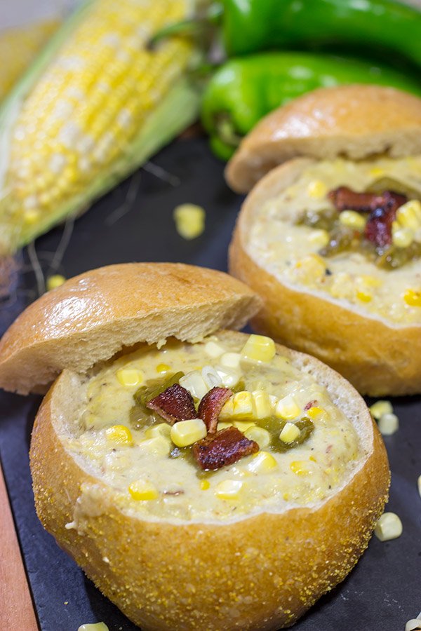 This Slow Cooker New England Corn Chowder includes a secret ingredient - roasted New Mexico green chile!  A bowl of this chowder is perfect for Autumn evenings.
